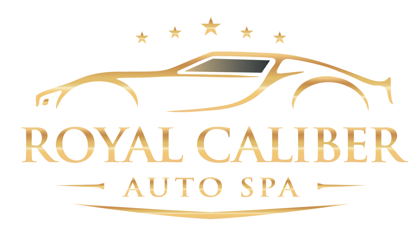 Gold logo featuring a car outline above the text