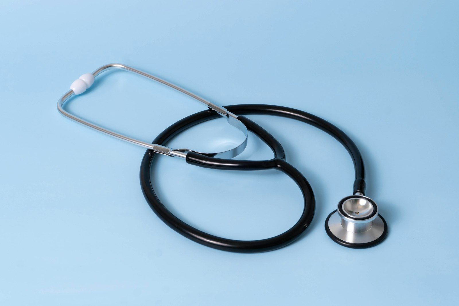 Stethoscope on a light blue background