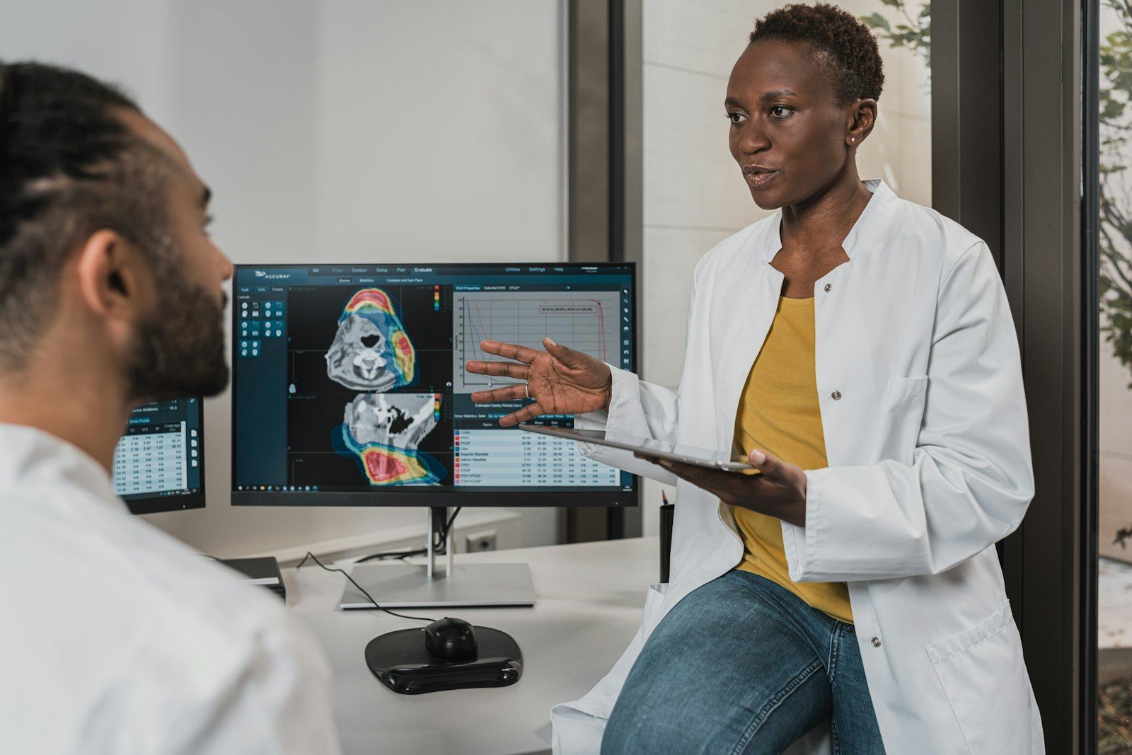 Doctor explaining results on a computer