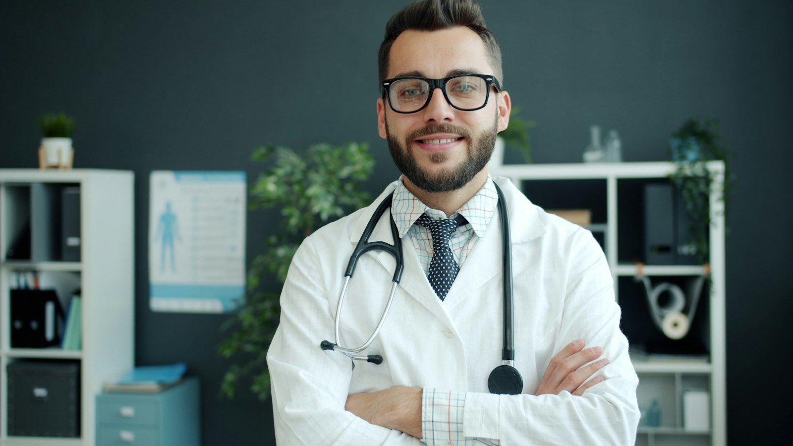 Smiling doctor with glasses and a stethoscope