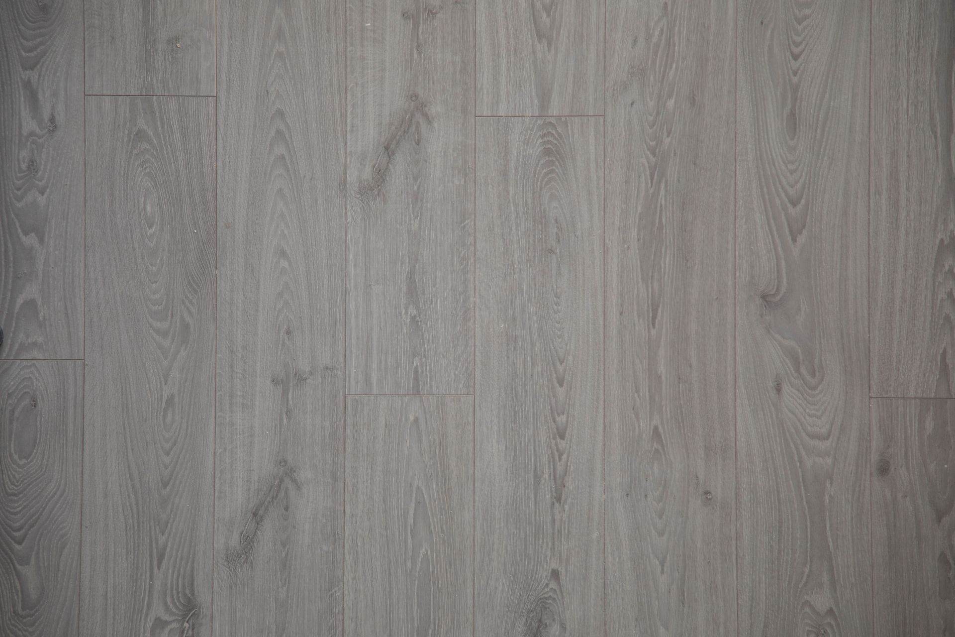 Gray wooden plank wall with a weathered texture