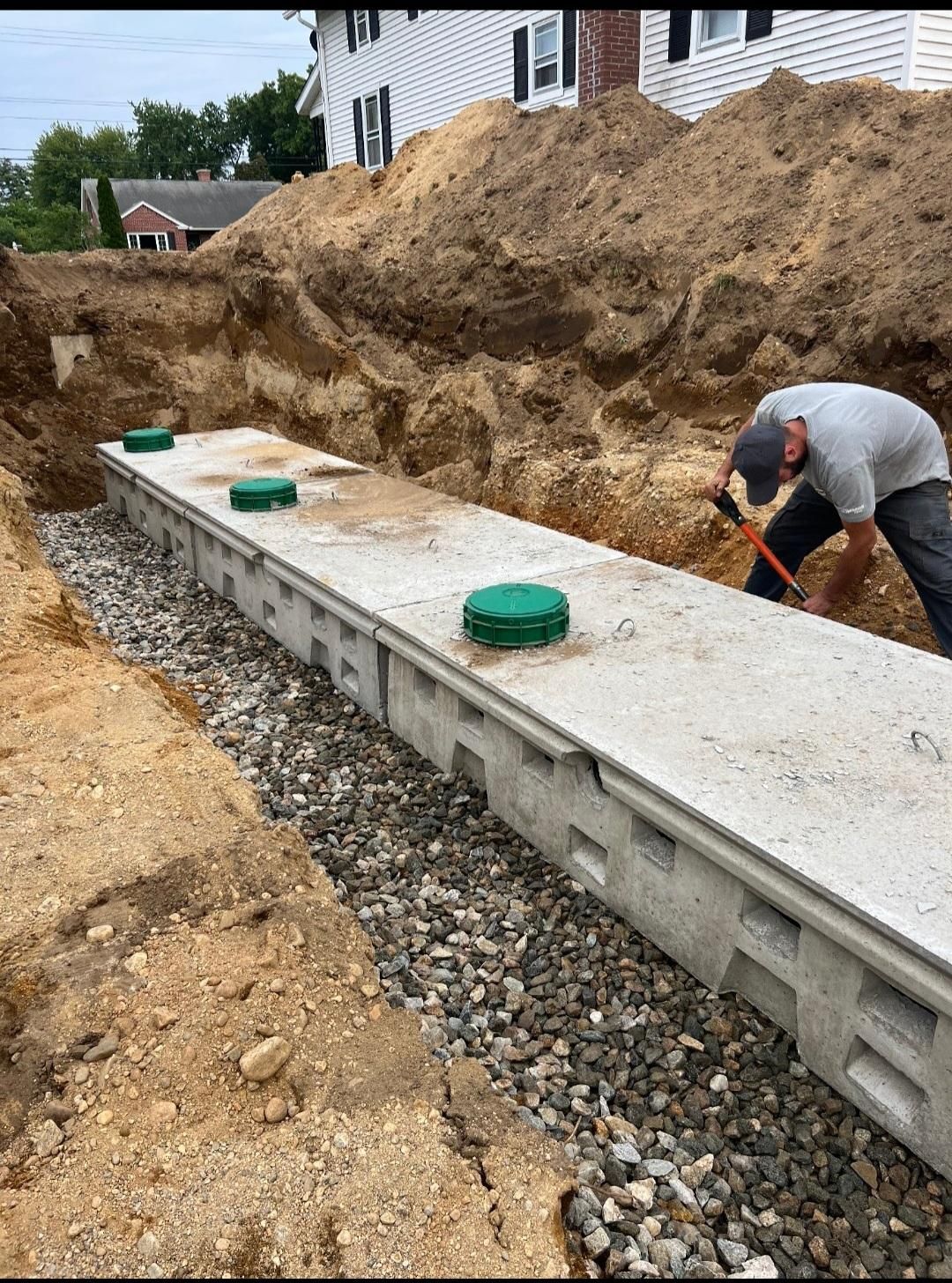 CleanSeptics crew performing septic system maintenance