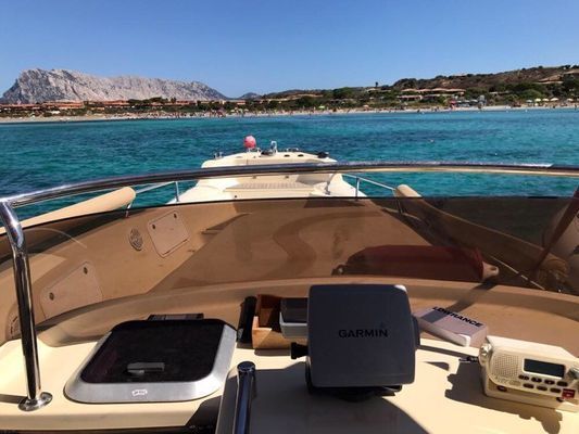 A boat with a garmin device on the front of it