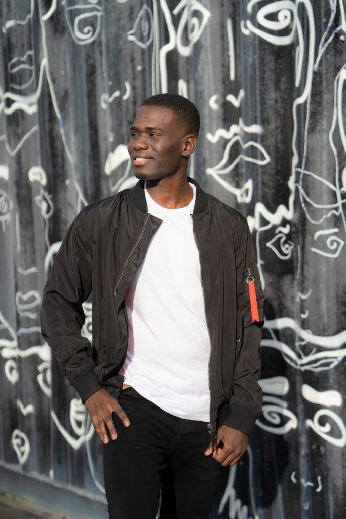 A man posing for a professional dating photo in Orange County