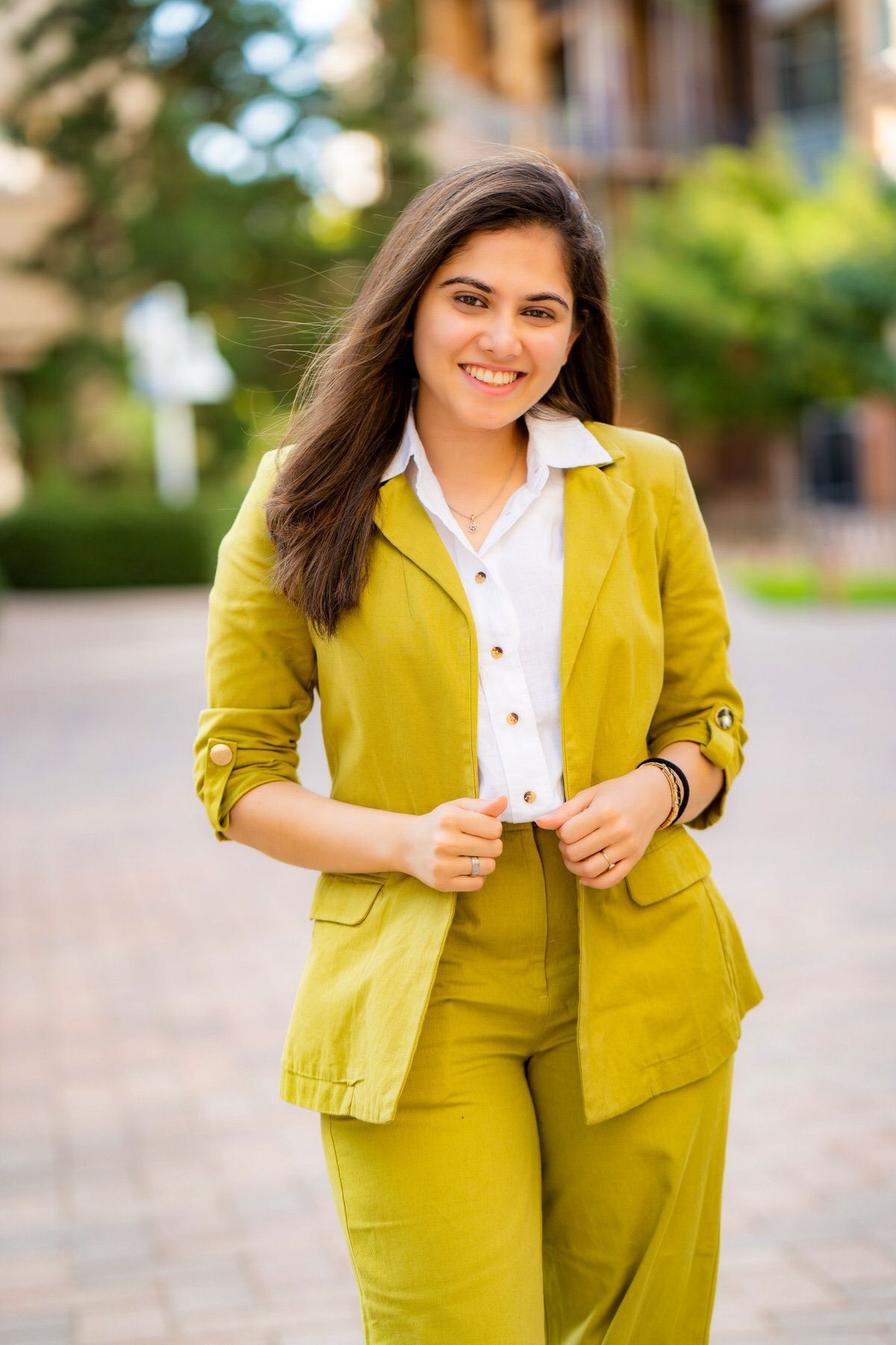 outdoor female headshot example — natural light personal branding headshot with blurred background