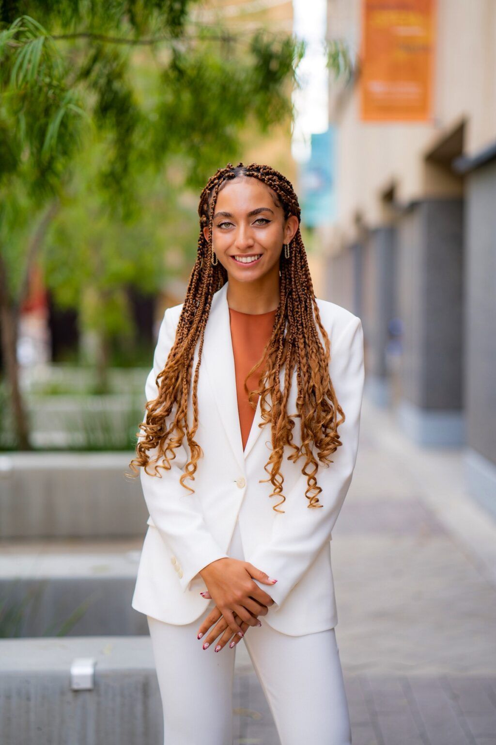 business headshot female — professional headshot example with soft natural lighting and natural smile