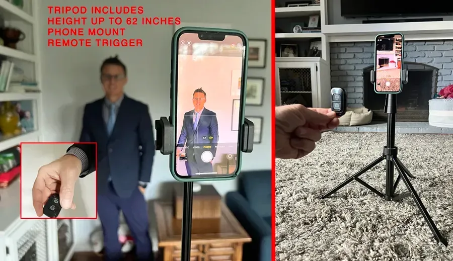 A man in a suit is standing next to a phone on a tripod.