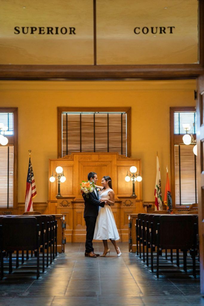 A bride and groom, get a marriage license in Orange County