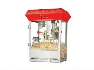A person is pouring popcorn into a cup from a machine.
