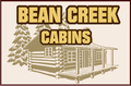 Logo for Bean Creek Cabins featuring tan text over a line drawing of a log cabin with a porch and pine trees.