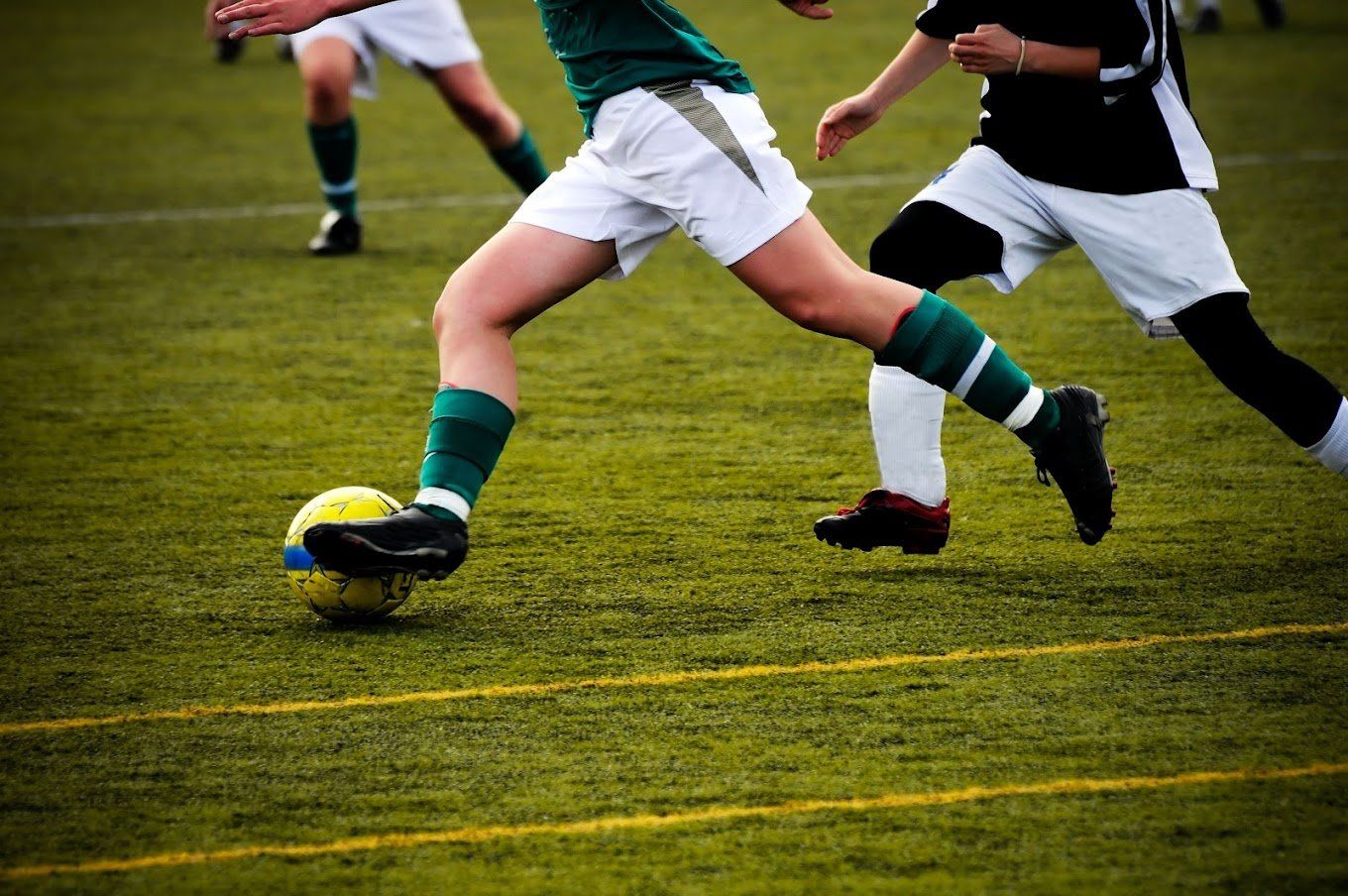 Playing soccer — Buffalo Grove, IL — Rosen Orthodontics Playing soccer — Buffalo Grove, IL — Rosen Orthodontics
