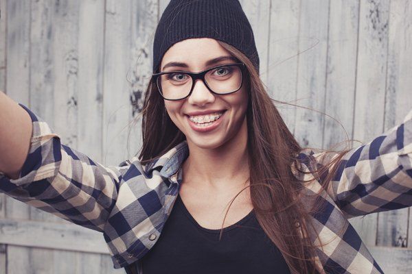 Woman wearing clear braces and bonnet — Buffalo Grove, IL — Rosen Orthodontics Woman wearing clear braces and bonnet — Buffalo Grove, IL — Rosen Orthodontics