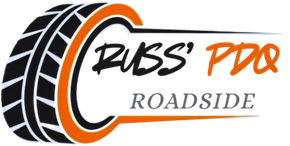 Russ&rsquo; Pro Roadside logo with black tire graphic and orange accent text