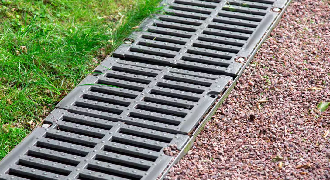 Channel drain installed by Elite Outdoor Living Solutions in Oklahoma