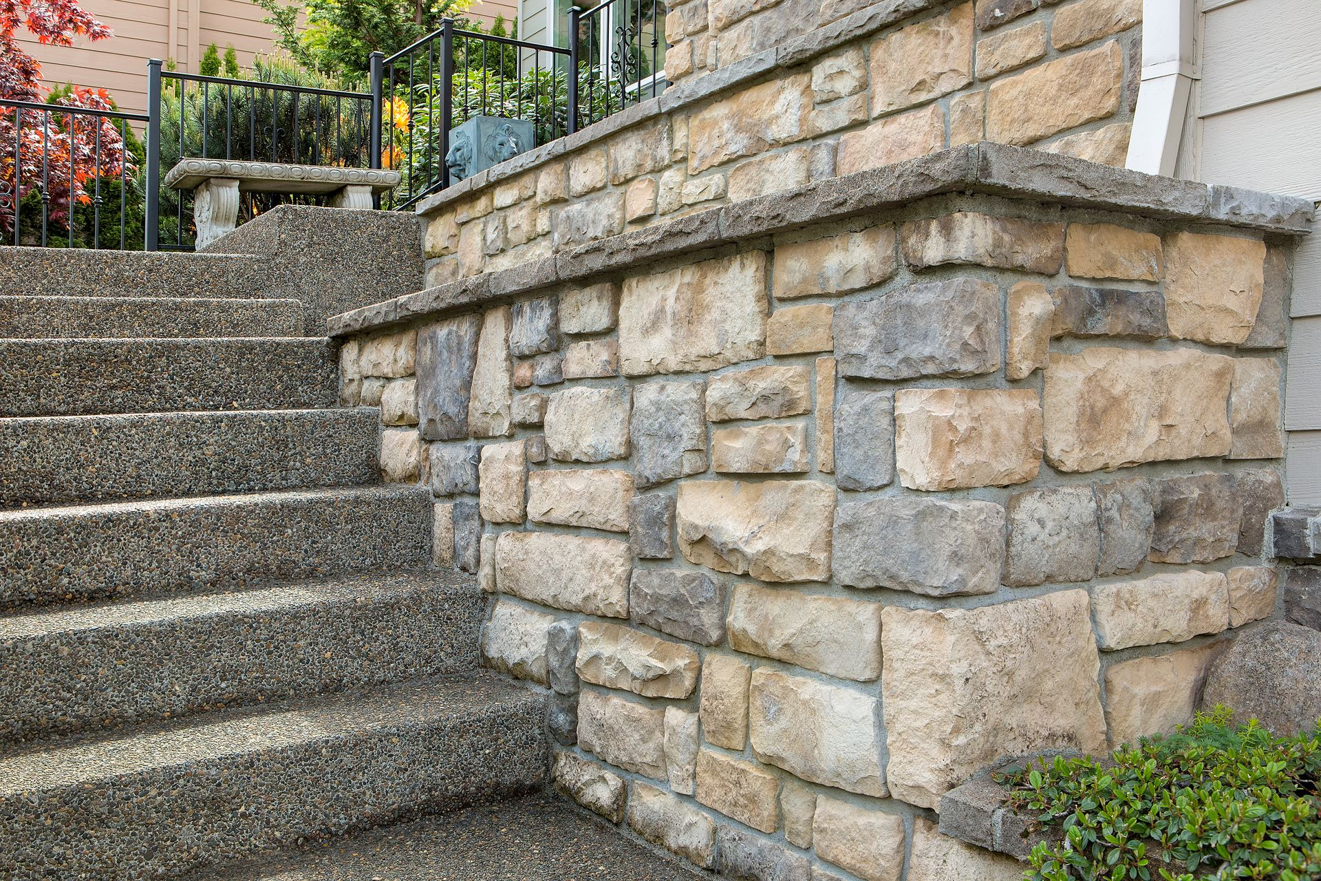 Elite Outdoor Living Solutions built a sturdy and stylish retaining wall in Oklahoma City, providing erosion control.