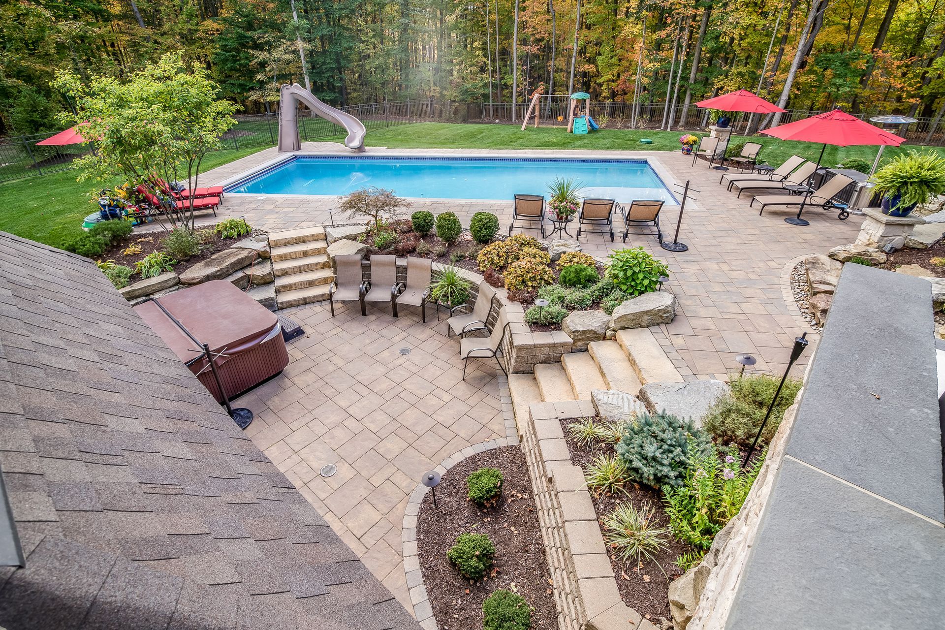 Elite Outdoor Living Solutions is installing a resort-style pool with a seating area in Oklahoma City.