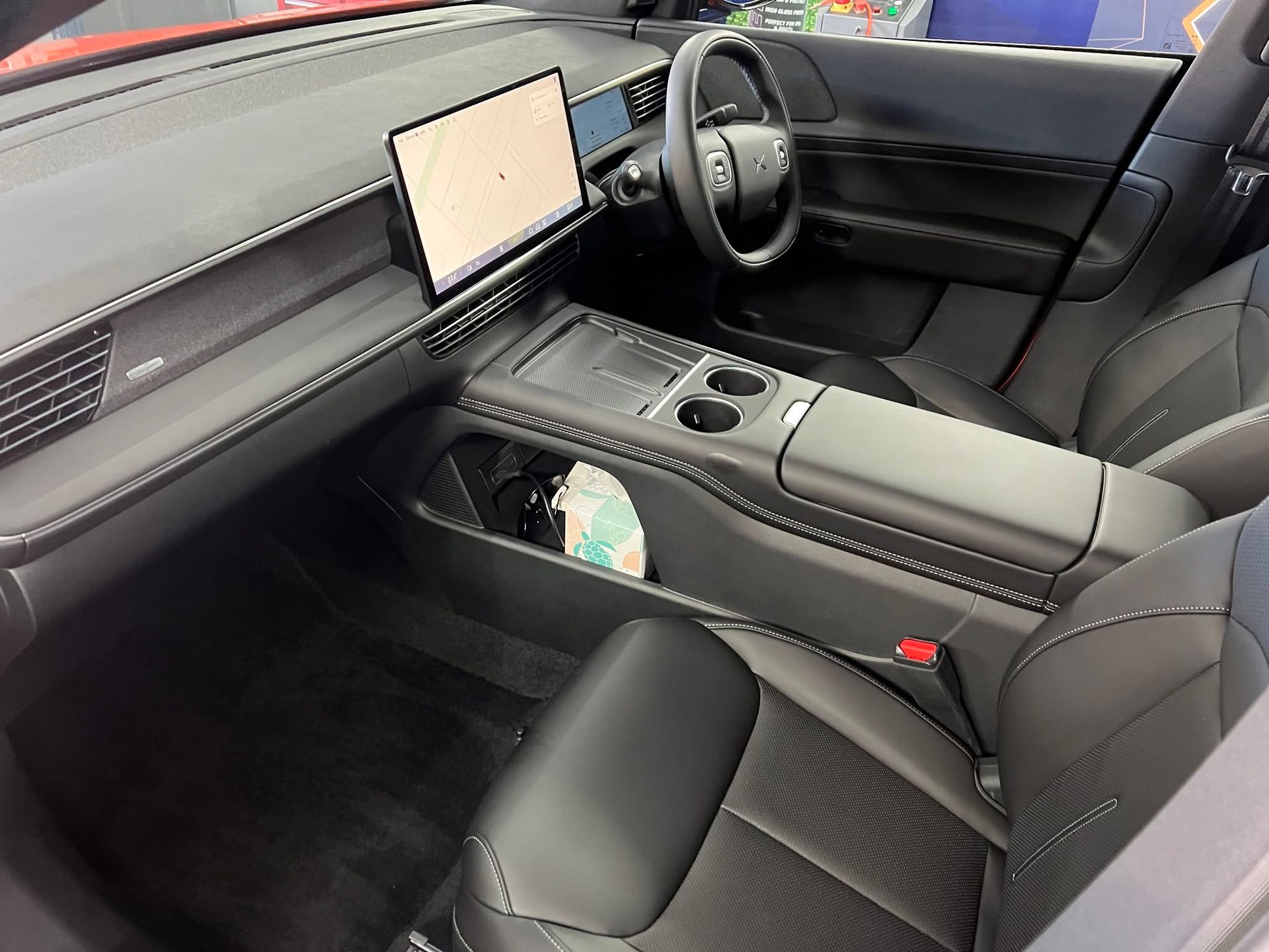 Modern Car Interior with Black Seats and Center Console — Straightline Detailing Cairns in Bungalow, QLD