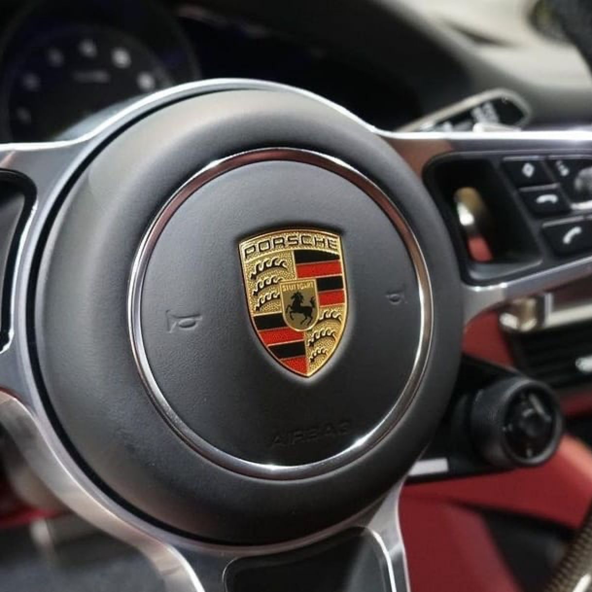 Porsche Steering Wheel with Crest — Straightline Detailing Cairns in Bungalow, QLD