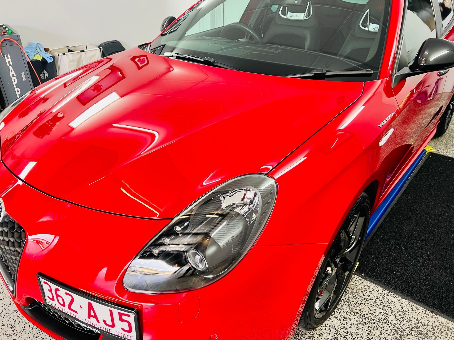 Red Sports Car Parked Outdoors — Straightline Detailing Cairns in Bungalow, QLD