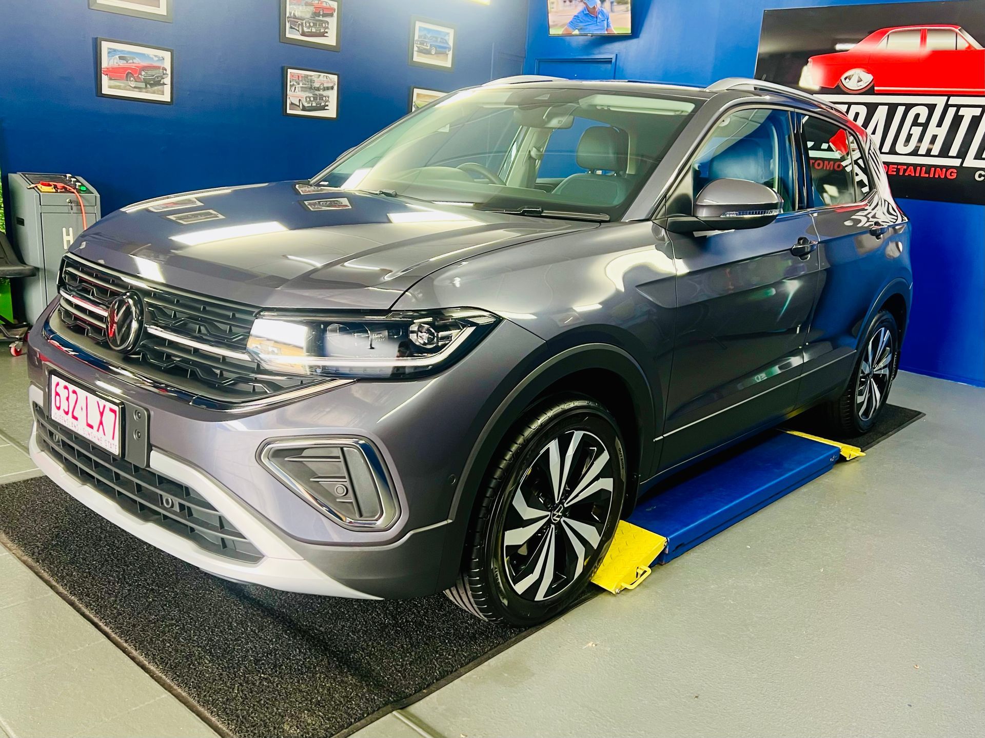 Gray Suv on Display in A Showroom, Angled Front View — Straightline Detailing Cairns in Bungalow, QLD