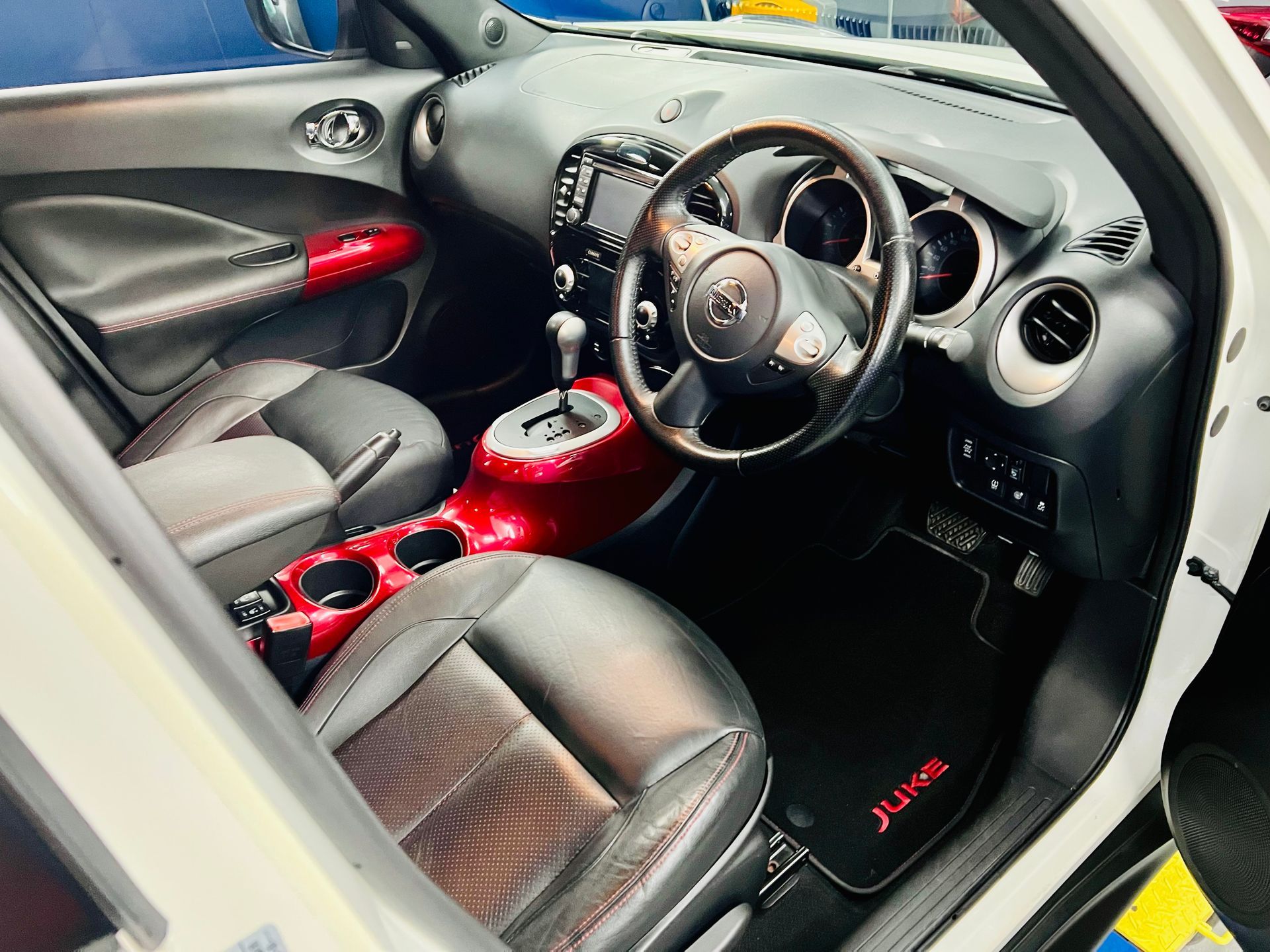 Car Interior with Black Leather Seats — Straightline Detailing Cairns in Bungalow, QLD