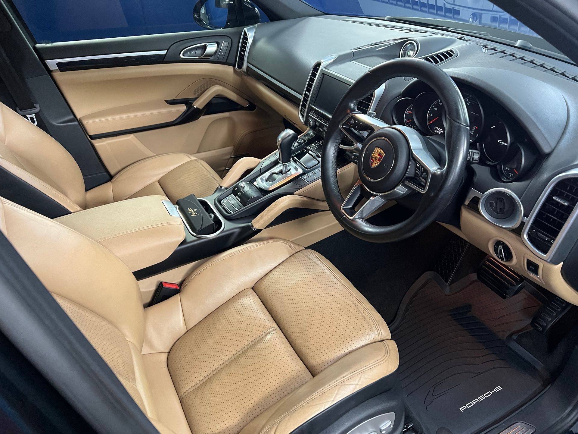 Luxury Car Interior with Tan Leather Seats — Straightline Detailing Cairns in Bungalow, QLD