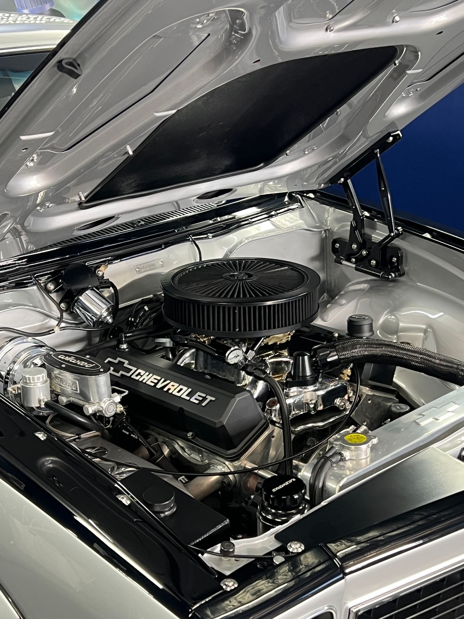 Open Car Hood Showing a Polished Engine Bay — Straightline Detailing Cairns in Bungalow, QLD
