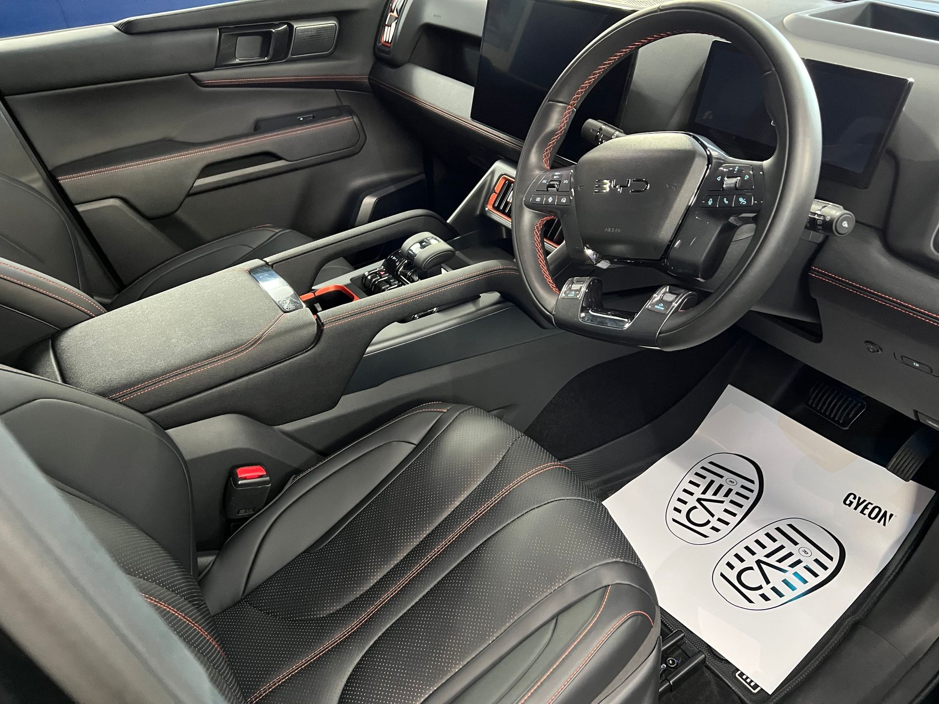 Modern Car Interior with Black Leather Seats — Straightline Detailing Cairns in Bungalow, QLD