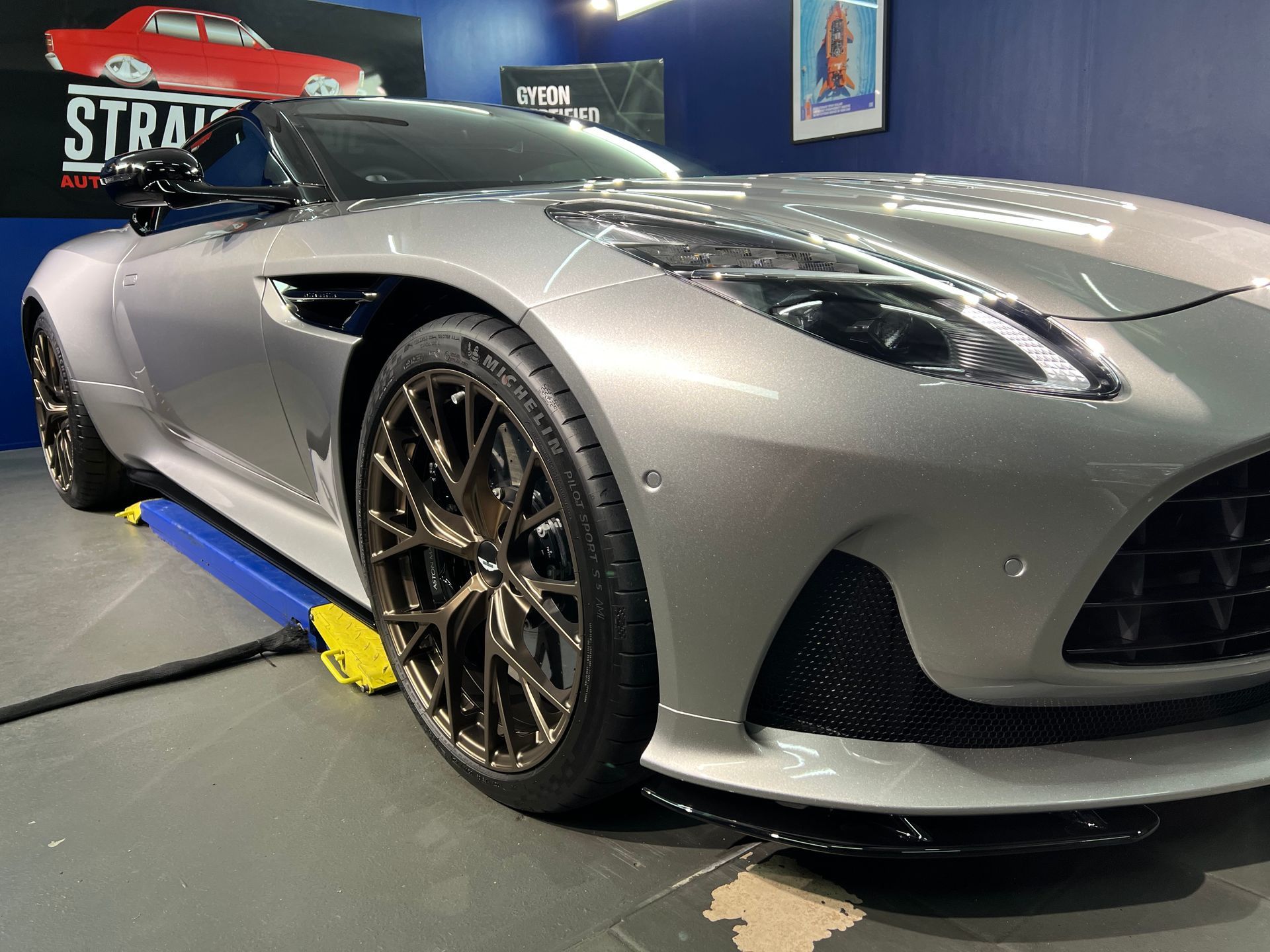 Silver Sports Car on Display Indoors, Shown from The Front-Left — Straightline Detailing Cairns in Bungalow, QLD