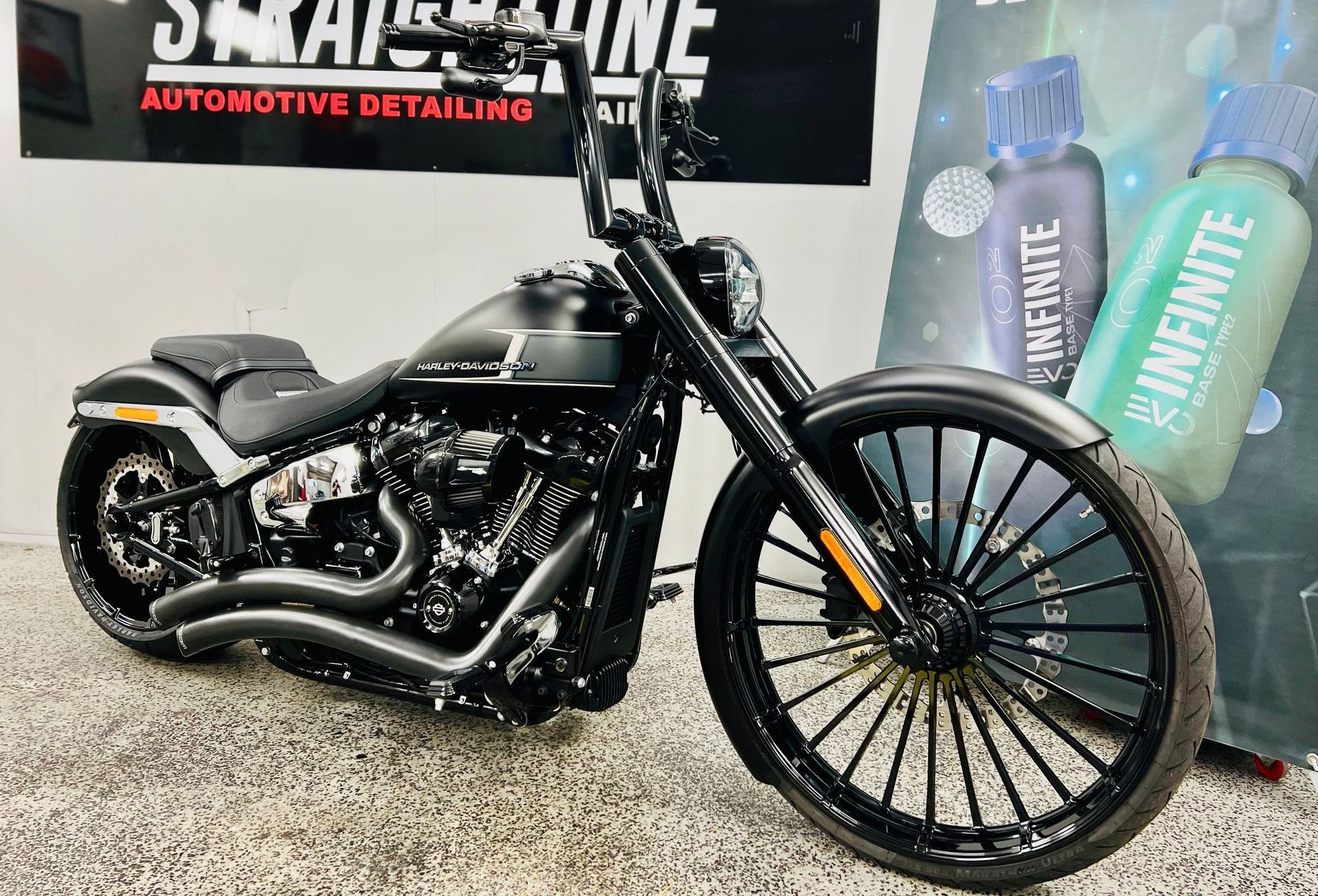 Black Custom Motorcycle on Display in An Auto Detailing Shop — Straightline Detailing Cairns in Bungalow, QLD