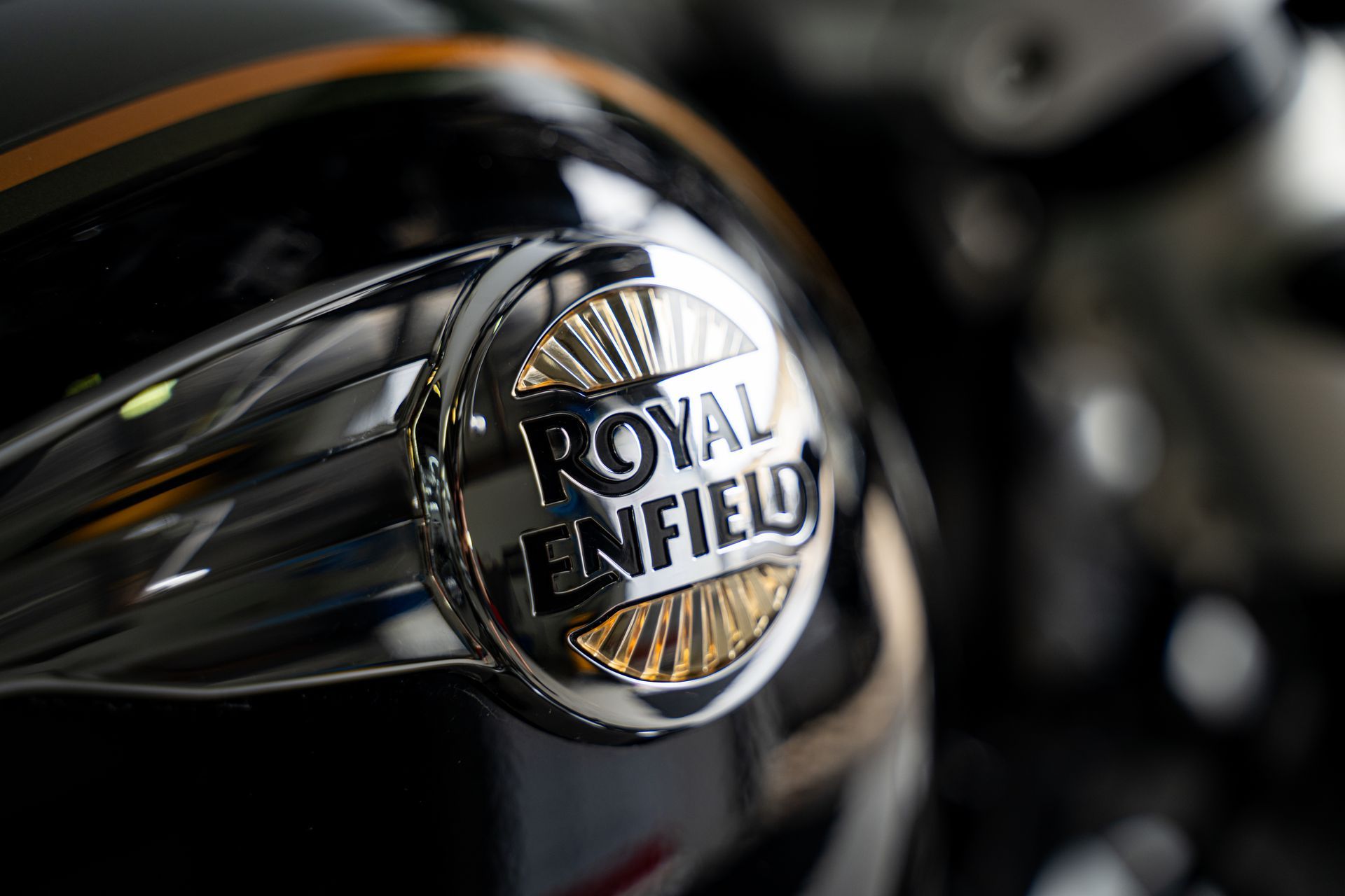 Close-Up of A Royal Enfield Motorcycle Fuel Tank Badge — Straightline Detailing Cairns in Bungalow, QLD