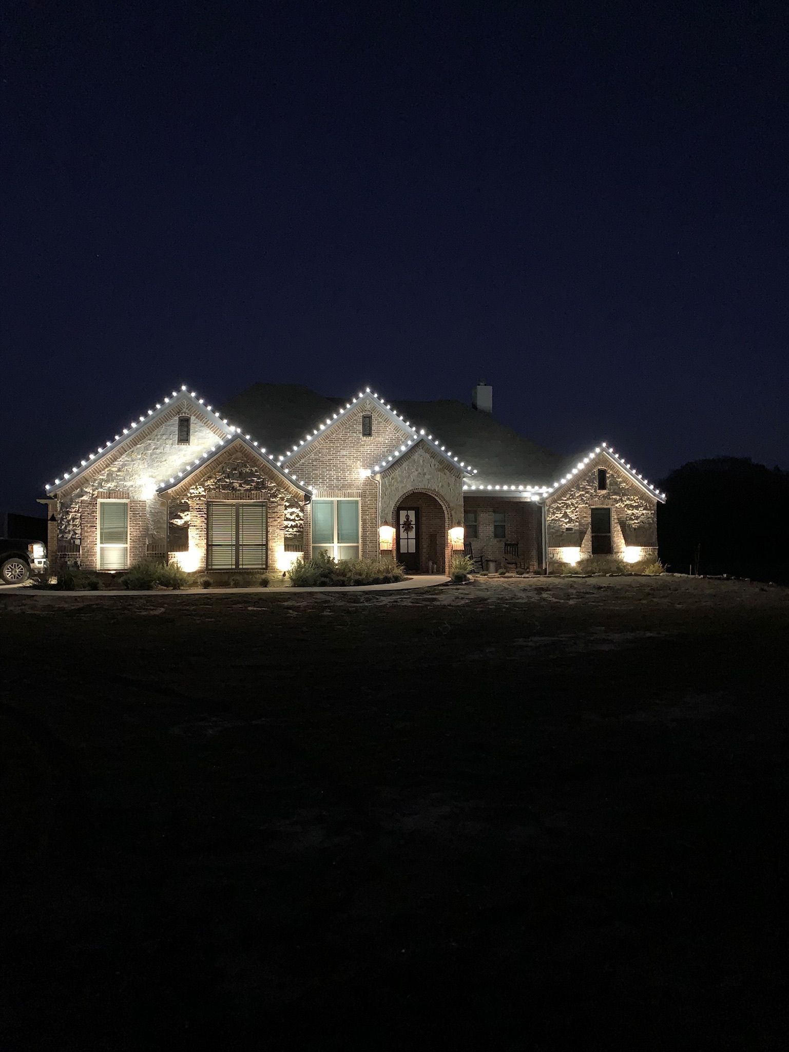 american style home white christmas lights