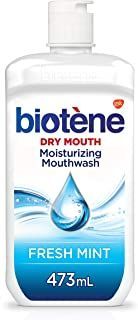 A bottle of biotene dry mouth moisturizing mouthwash fresh mint 473ml.