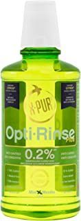 A bottle of opti-rinse 0.2 % is sitting on a table.