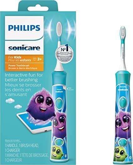 A philips sonicare for kids electric toothbrush with a charger.