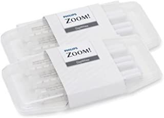 A pair of philips zoom teeth whitening cartridges in a plastic container.