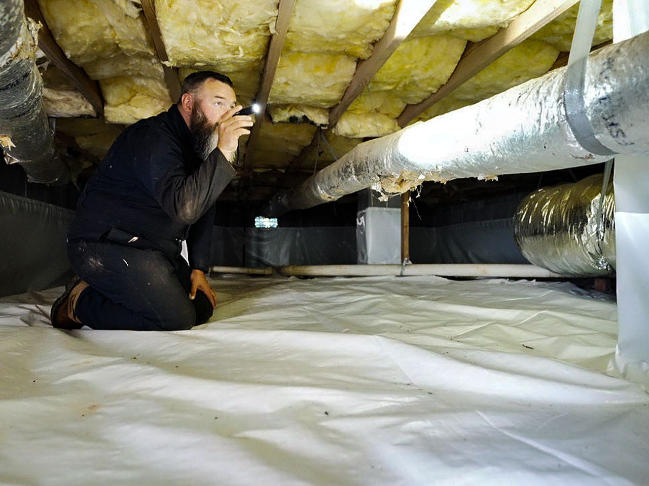Termite control technician taking notes.