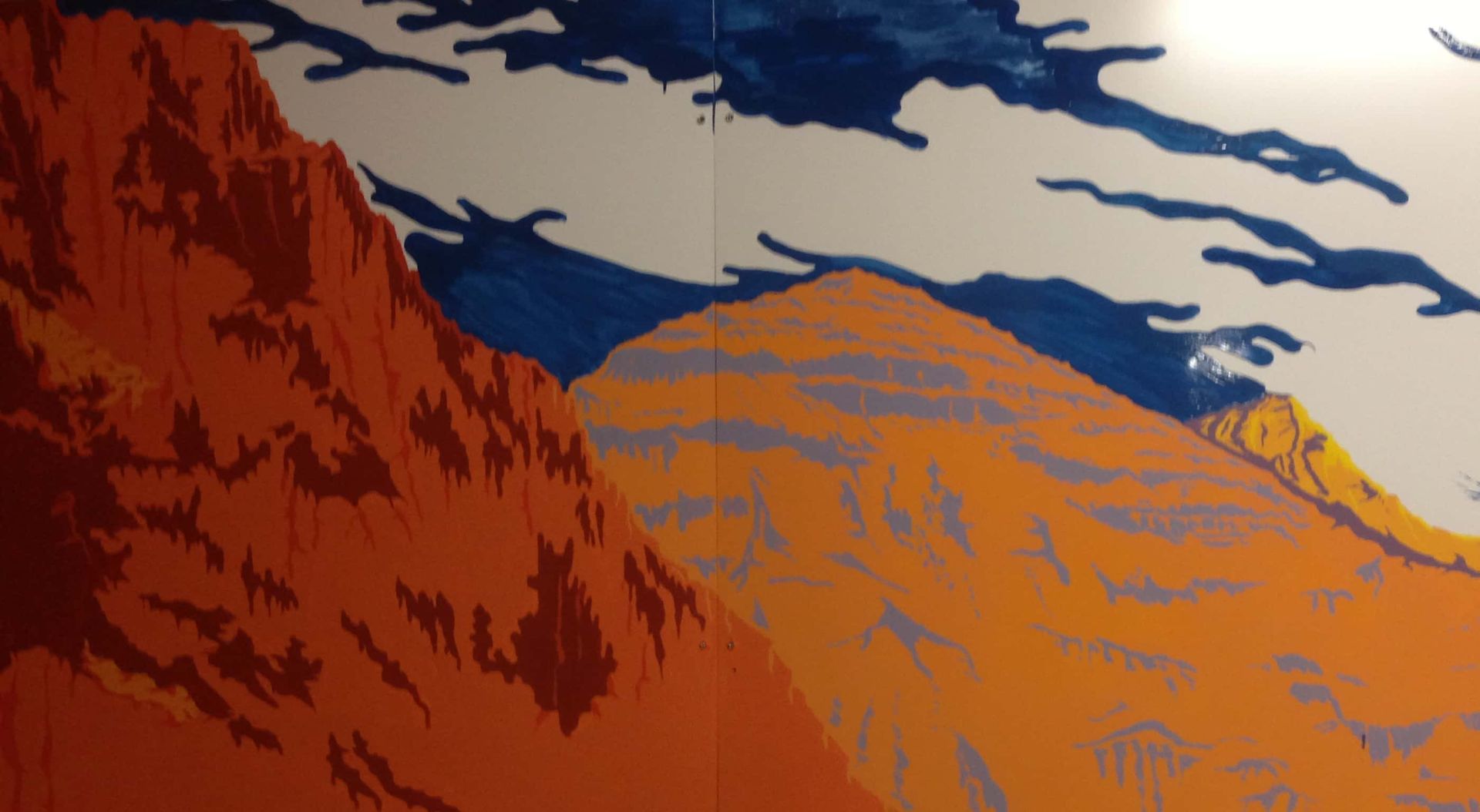 A painting of a mountain with a lake in the background