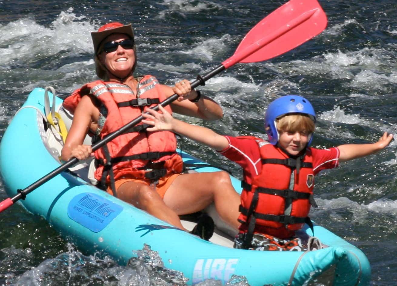 Woman and Child Riding a Raft