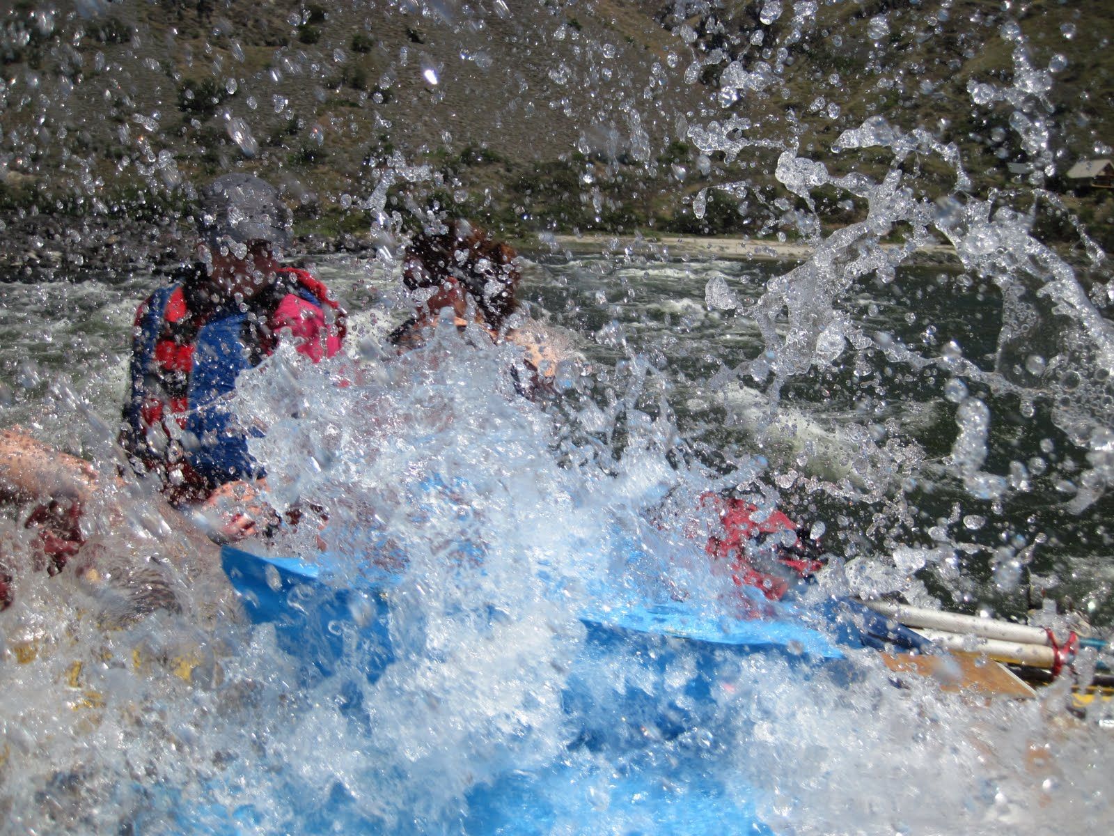 A group of people are rafting down a river.