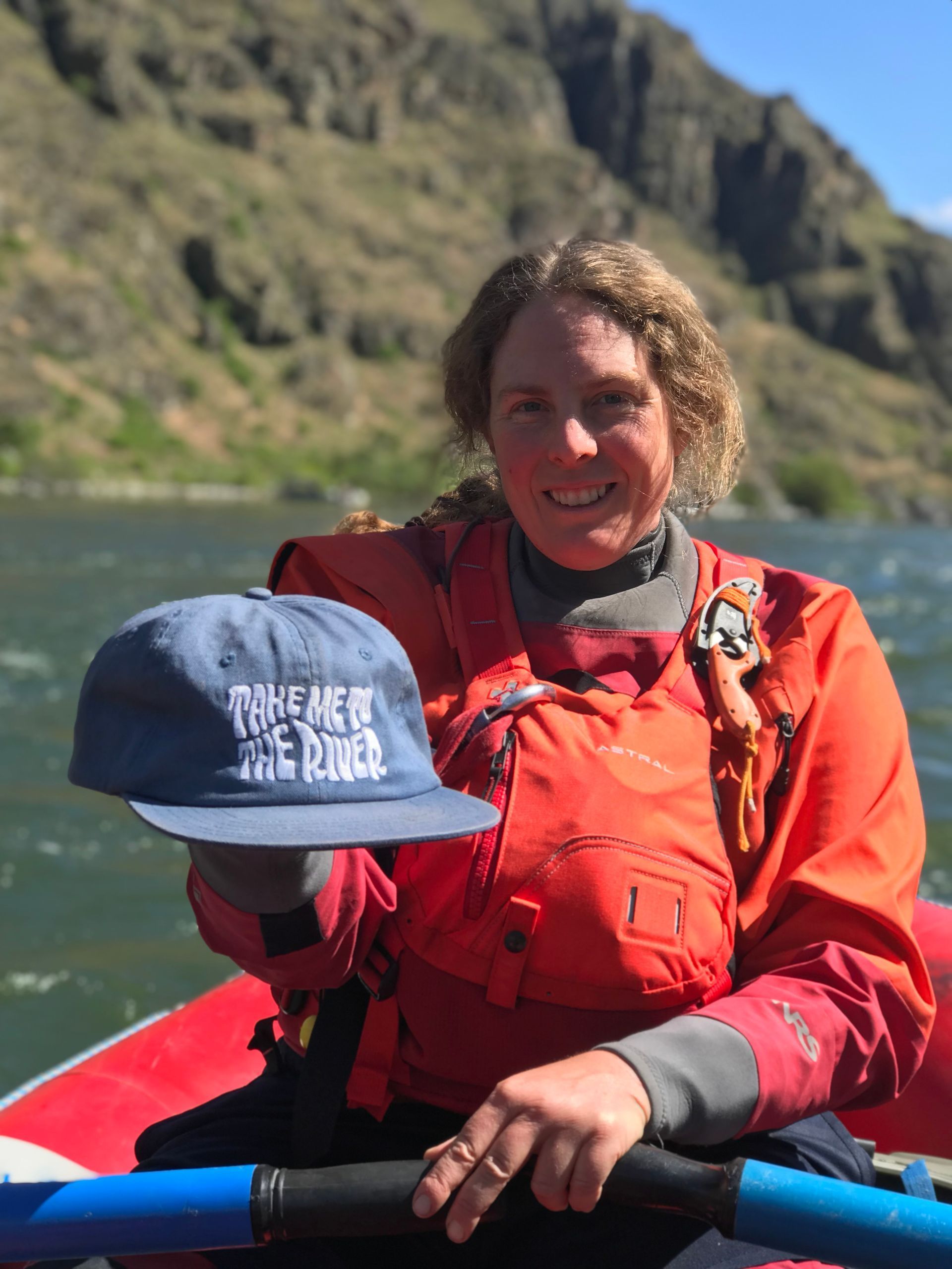 raft guiding with river hat
