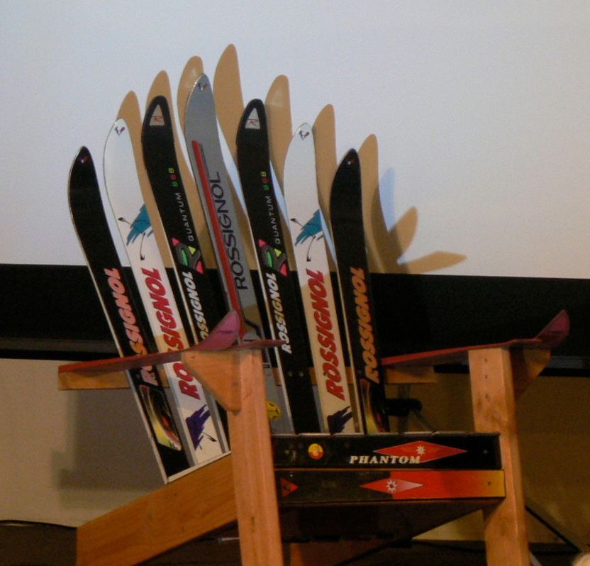 A row of skis with the word rossignol on them