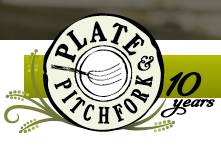 A logo for plate pitchfork with a fork in the center