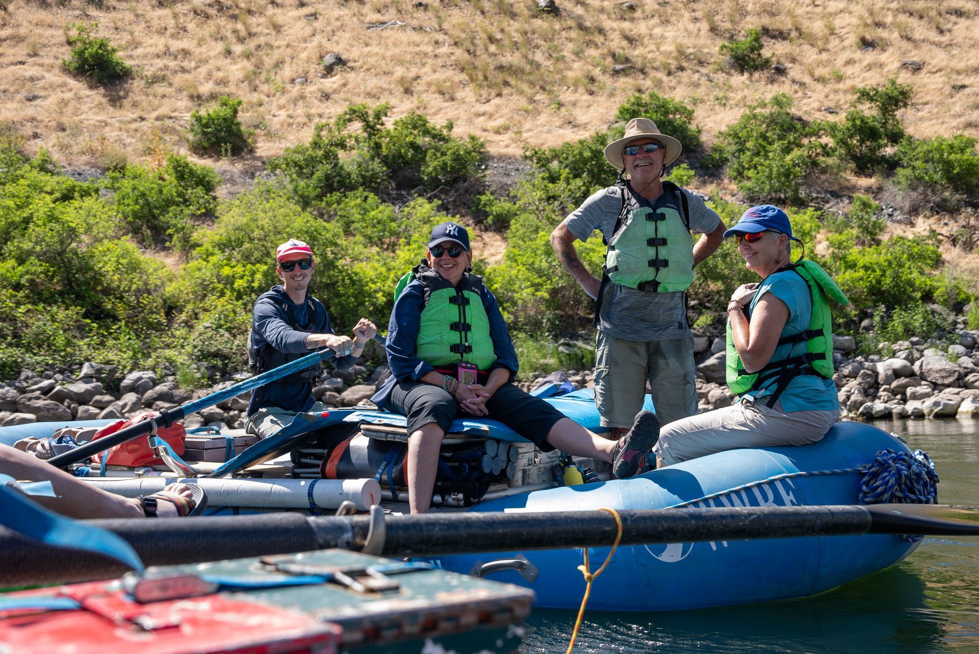 people sitting on a raft
