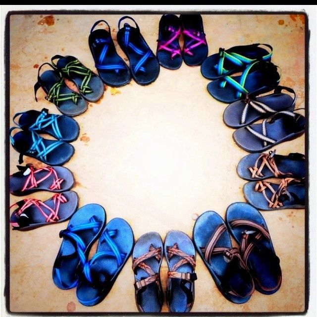 A circle of sandals in different colors and sizes