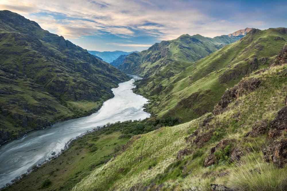 A River Runs Through a Valley Between Two Mountains