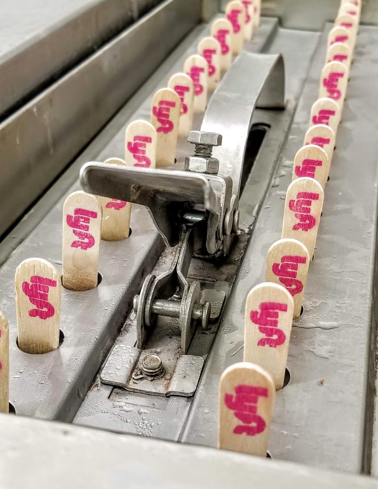 A row of ice cream sticks with the word lyft written on them.
