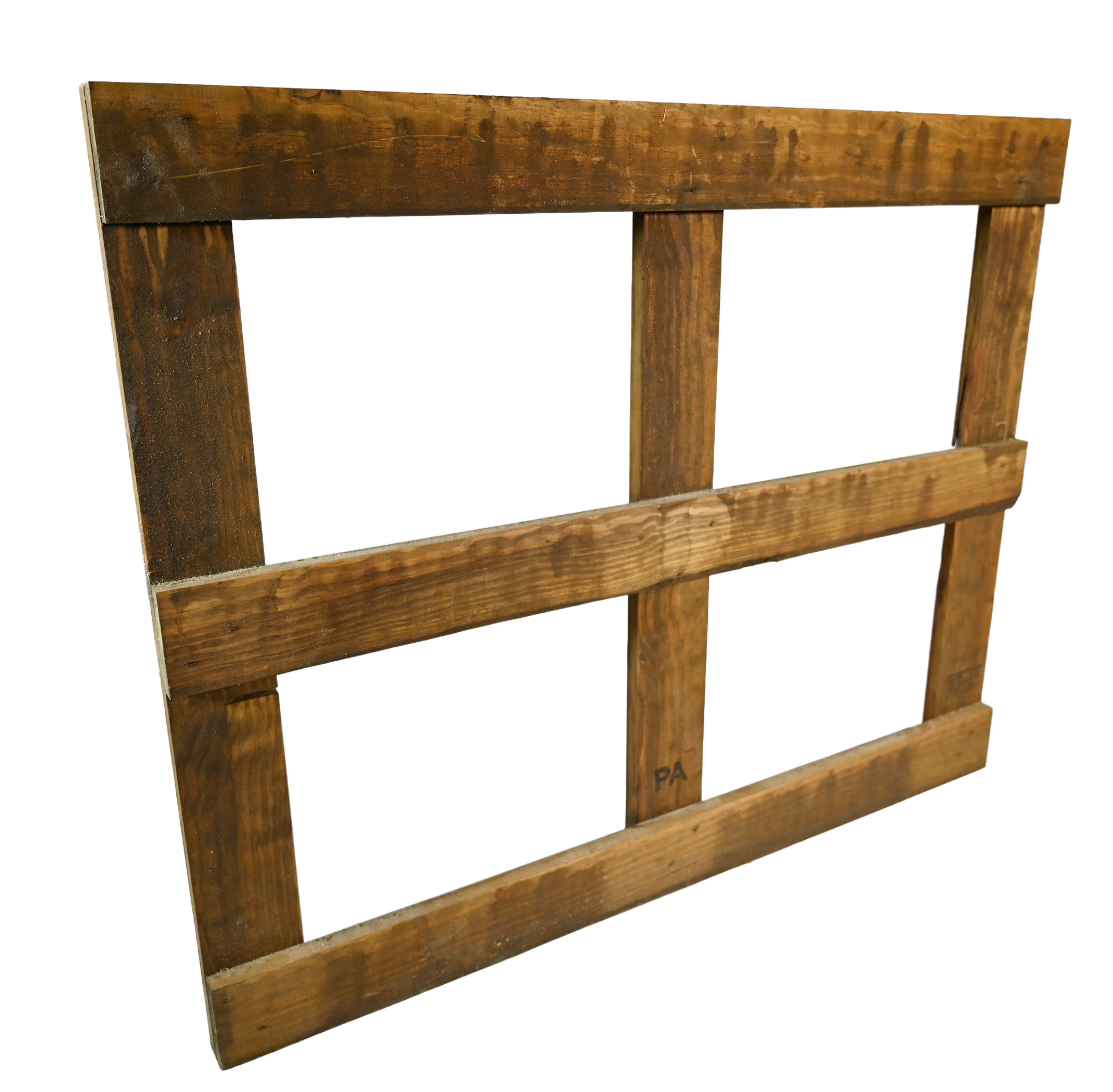 Wooden box frame under construction, set on a plywood surface with tools, in a workshop.