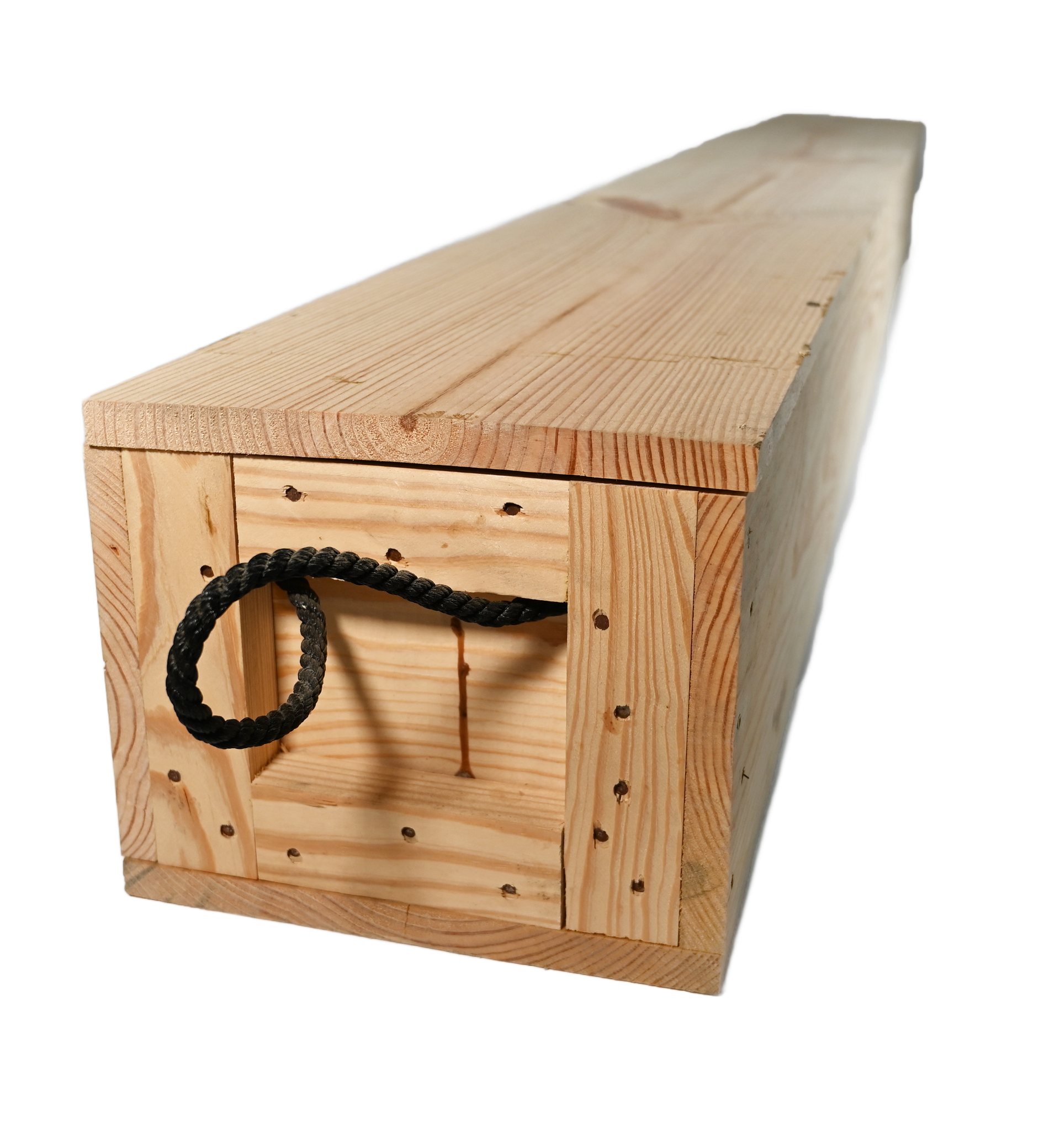 Wooden box frame under construction, set on a plywood surface with tools, in a workshop.