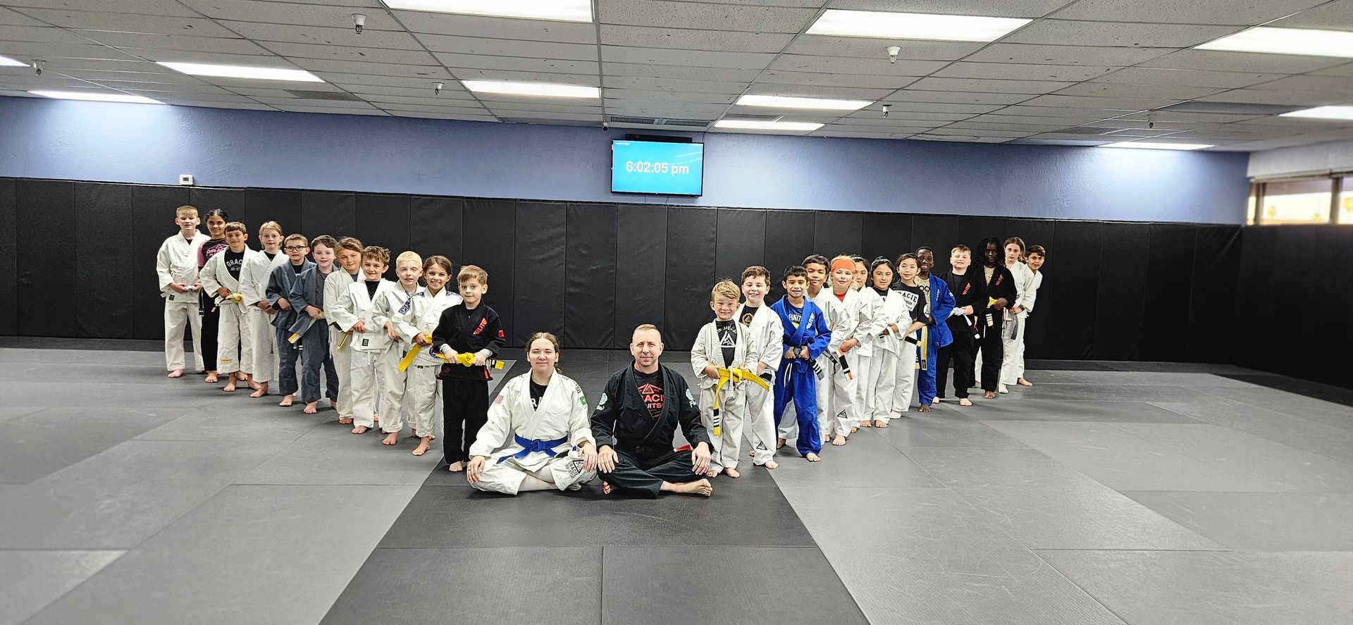 Adults training grappling drills at Centerline Jiu-Jitsu Chandler in Chandler, AZ for stress relief.